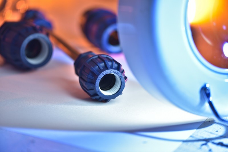 Quality-control technician operating laboratory test equipment